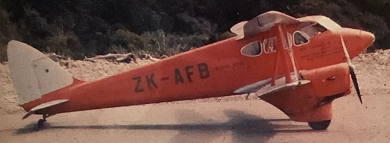 Historic orange-painted Dragonfly aircraft ZK-AFB.